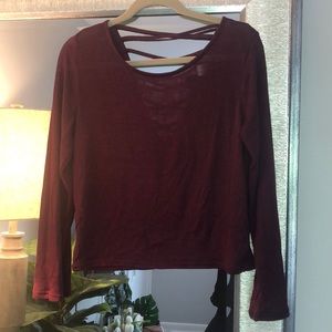Slightly sheer long sleeve with detailed back